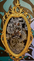 Hand engraved mirror
