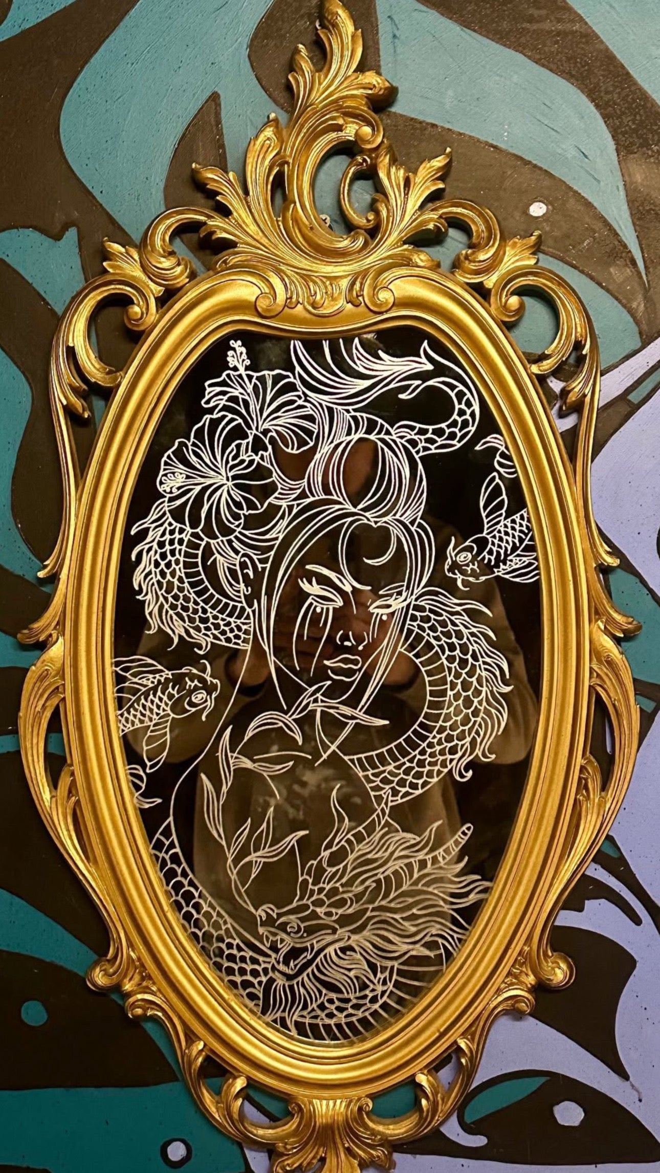 Hand engraved mirror